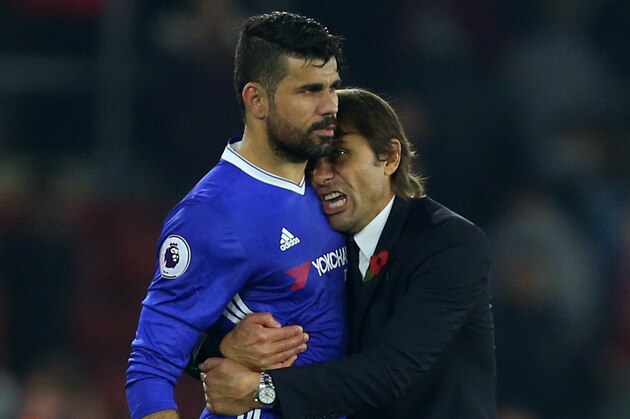 SOUTHAMPTON, ENGLAND - OCTOBER 30: Antonio Conte manager / head coach of Chelsea hugs Diego Costa of Chelsea after the Premier League match between Southampton and Chelsea at St Mary's Stadium on October 30, 2016 in Southampton, England. (Photo by Catherine Ivill - AMA/Getty Images)