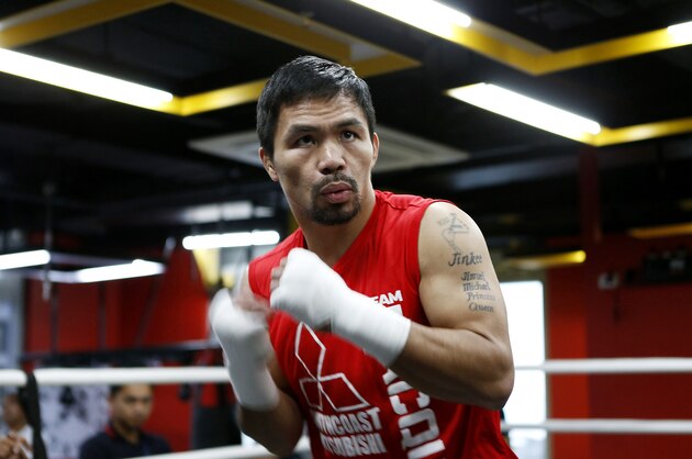 MANILA, PHILIPPINES - SEPTEMBER 30: Manny Pacquiao in action during a training session on September 30, 2016 in Manila, Philippines. (Photo by Jeoffrey Maitem/Getty Images) MANILA, PHILIPPINES - SEPTEMBER 30: Manny Pacquiao in action during a training session on September 30, 2016 in Manila, Philippines. (Photo by Jeoffrey Maitem/Getty Images)