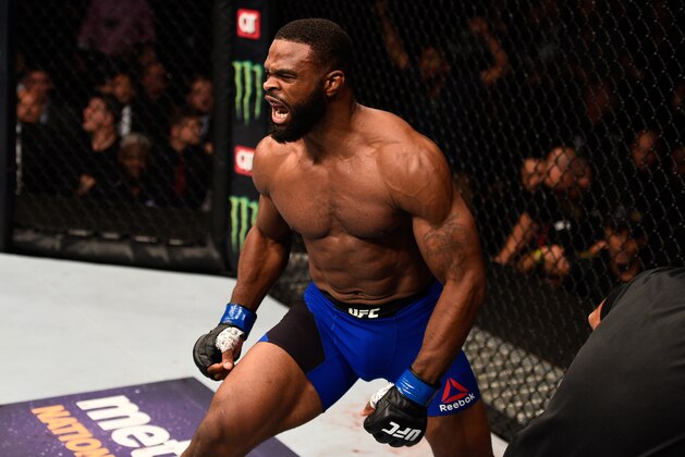 ATLANTA, GA - JULY 30:  Tyron Woodley celebrates after knocking out Robbie Lawler in their welterweight championship bout during the UFC 201 event on July 30, 2016 at Philips Arena in Atlanta, Georgia. (Photo by Jeff Bottari/Zuffa LLC/Zuffa LLC via Getty Images)