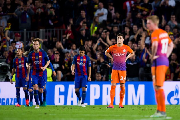 BARCELONA, SPAIN - OCTOBER 19: John Stones of Manchester City FC looks dejected after FC Barcelona scored a goal during the UEFA Champions League group C match between FC Barcelona and Manchester City FC at Camp Nou on October 19, 2016 in Barcelona, Spain. (Photo by Alex Caparros/Getty Images)