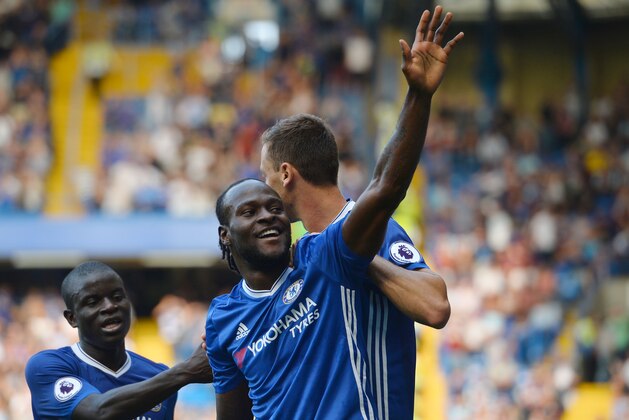 Chelsea's Nigerian midfielder Victor Moses celebrates after scoring during the English Premier League football match between Chelsea and Burnley at Stamford Bridge in London on August 27, 2016. / AFP / GLYN KIRK / RESTRICTED TO EDITORIAL USE. No use with unauthorized audio, video, data, fixture lists, club/league logos or 'live' services. Online in-match use limited to 75 images, no video emulation. No use in betting, games or single club/league/player publications.  /         (Photo credit should read GLYN KIRK/AFP/Getty Images)