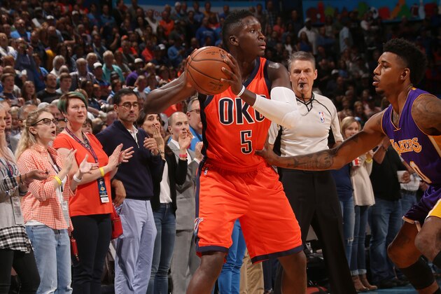 OKLAHOMA CITY, OK - OCTOBER 30: Victor Oladipo #5 of the Oklahoma City Thunder looks to pass against the Los Angeles Lakers on October 30, 2016 at Chesapeake Energy Arena in Oklahoma City, Oklahoma. NOTE TO USER: User expressly acknowledges and agrees that, by downloading and or using this photograph, User is consenting to the terms and conditions of the Getty Images License Agreement. Mandatory Copyright Notice: Copyright 2016 NBAE (Photo by Layne Murdoch/NBAE via Getty Images)