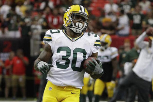 Green Bay Packers running back Knile Davis (30) warms up before the first of an NFL football game between the Atlanta Falcons and the Green Bay Packers, Sunday, Oct. 30, 2016, in Atlanta. (AP Photo/David Goldman)