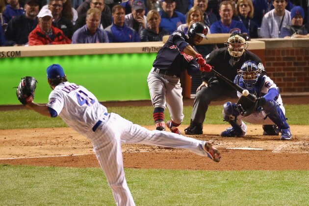 CHICAGO, IL - OCTOBER 29:  Francisco Lindor #12 of the Cleveland Indians hits a single off of John Lackey #41 of the Chicago Cubs in the third inning in Game Four of the 2016 World Series at Wrigley Field on October 29, 2016 in Chicago, Illinois.  (Photo by Stacy Revere/Getty Images)