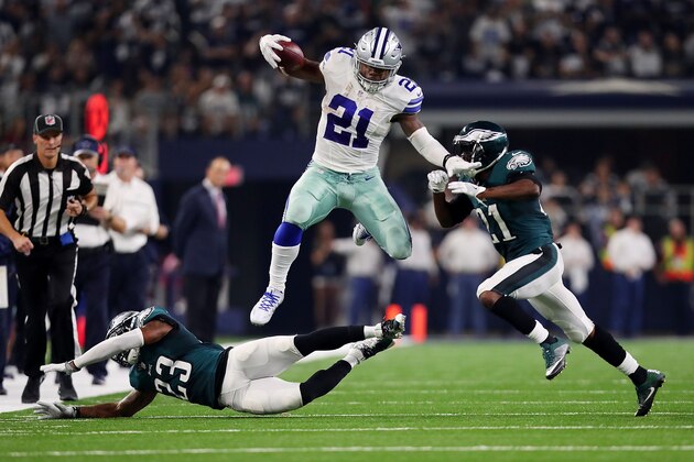 ARLINGTON, TX - OCTOBER 30:  Ezekiel Elliott #21 of the Dallas Cowboys runs the ball against Rodney McLeod #23 of the Philadelphia Eagles in the second quarter during a game between the Dallas Cowboys and the Philadelphia Eagles at AT&T Stadium on October 30, 2016 in Arlington, Texas.  (Photo by Tom Pennington/Getty Images)
