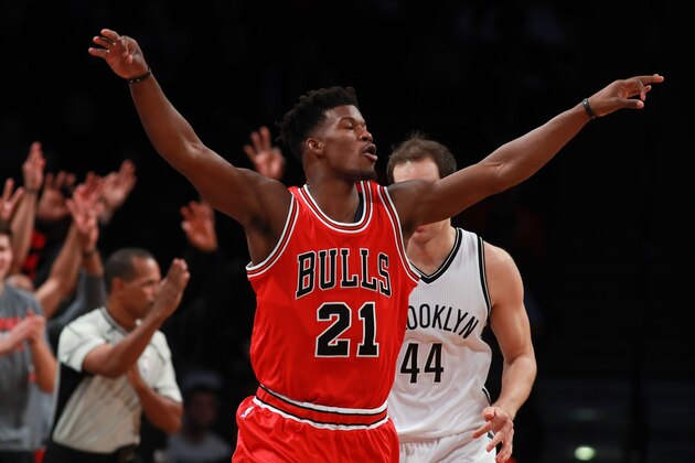 NEW YORK, NY - OCTOBER 31:  Jimmy Butler #21 of the Chicago Bulls celebrates after hitting a three pointer against the Brooklyn Nets during the first half at Barclays Center on October 31, 2016 in New York City. NOTE TO USER: User expressly acknowledges and agrees that, by downloading and or using this photograph, User is consenting to the terms and conditions of the Getty Images License Agreement.  (Photo by Michael Reaves/Getty Images)