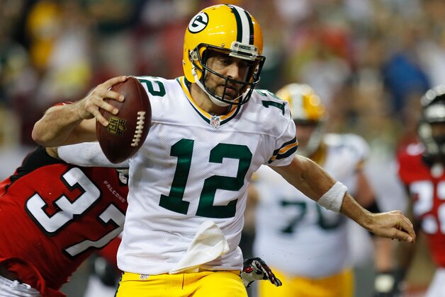 ATLANTA, GA - OCTOBER 30:  Aaron Rodgers #12 of the Green Bay Packers scores a two-point conversion past Ricardo Allen #37 of the Atlanta Falcons at Georgia Dome on October 30, 2016 in Atlanta, Georgia.  (Photo by Kevin C. Cox/Getty Images)