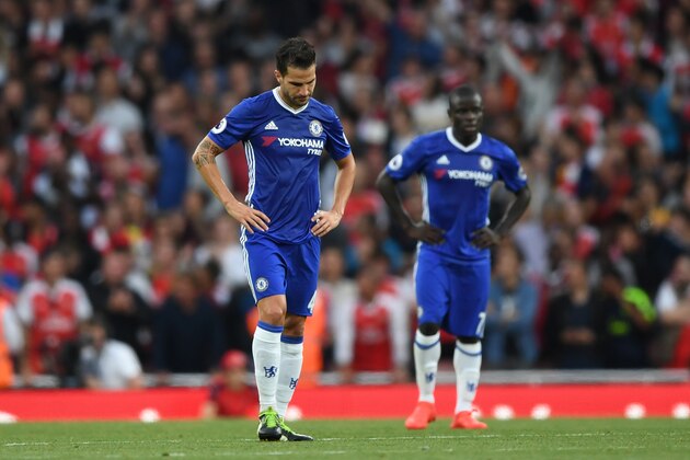 LONDON, ENGLAND - SEPTEMBER 24: Cesc Fabregas of Chelsea (L) show dejection after Arsenal score  during the Premier League match between Arsenal and Chelsea at the Emirates Stadium on September 24, 2016 in London, England.  (Photo by Shaun Botterill/Getty Images)