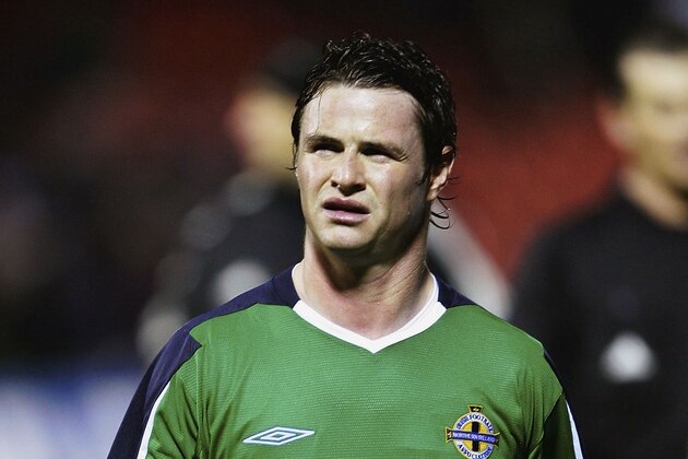 BELFAST,  N IRELAND - FEBRUARY 9:  Philip Mulryne of Northern Ireland trudges off the pitch after their 1-0 loss to Canada in the International Challenge match on February 9, 2005 in Belfast, Northern Ireland.  (Photo by Bryn Lennon/Getty Images)