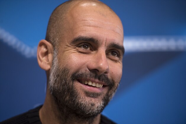 Manchester City's Spanish manager Pep Guardiola addresses the media during a press conference at the City Football Academy in Manchester, northern England, on October 31, 2016, ahead of their UEFA Champions League group C football match against Barcelona on November 1.  / AFP / OLI SCARFF        (Photo credit should read OLI SCARFF/AFP/Getty Images)