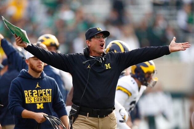 EAST LANSING, MI - OCTOBER 29: Head coach Jim Harbaugh reacts on the sidelines while playing the Michigan State Spartans at Spartan Stadium on October 29, 2016 in East Lansing, Michigan. Michigan won the game 32-23. (Photo by Gregory Shamus/Getty Images)