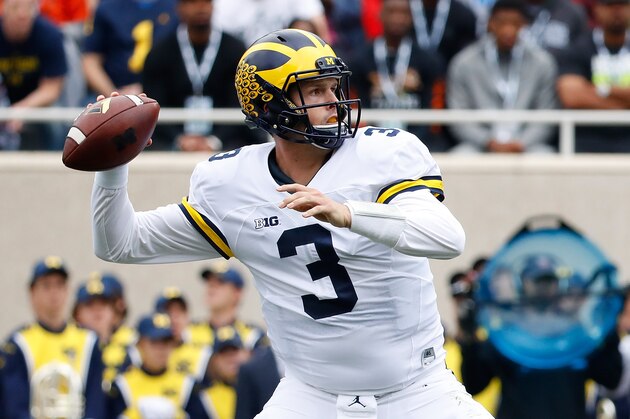 EAST LANSING, MI - OCTOBER 29: Wilton Speight #3 of the Michigan Wolverines drops back to pass during the third quarter of the game against the Michigan State Spartans at Spartan Stadium on October 29, 2016 in East Lansing, Michigan. Michigan defeated Michigan State 32-23. (Photo by Leon Halip/Getty Images)