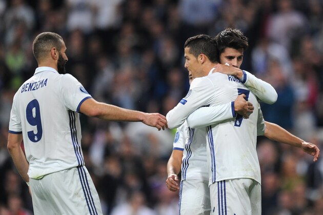 MADRID, SPAIN - OCTOBER 18: Alvaro Morata (C) of Real Madrid celebrates scoring his team's fifth goal with his team mates Karim Benzema (L) and Cristiano Ronaldo (R) during the UEFA Champions League Group F match between Real Madrid CF and Legia Warszawa at Bernabeu on October 18, 2016 in Madrid, Spain.  (Photo by Denis Doyle/Getty Images)
