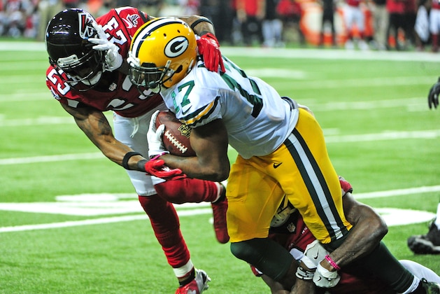 ATLANTA, GA - OCTOBER 30: Davante Adams #17 of the Green Bay Packers is tackled by Robert Alford #23 and Brian Poole #34 of the Atlanta Falcons at the Georgia Dome on October 30, 2016 in Atlanta, Georgia. (Photo by Scott Cunningham/Getty Images)