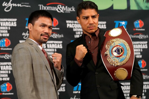 BEVERLY HILLS, CA - SEPTEMBER 08:  Welterweight Manny Pacquiao and Jessie Vargas pose after a press conference at the Beverly Hills Hotel on September 8, 2016 in Beverly Hills, California.  (Photo by Josh Lefkowitz/Getty Images)