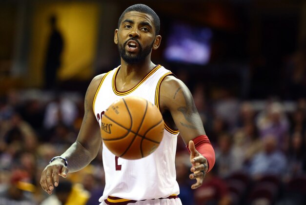 Oct 8, 2016; Cleveland, OH, USA; Cleveland Cavaliers guard Kyrie Irving (2) controls the ball against the Philadelphia 76ers in the first half at Quicken Loans Arena. The Cavaliers won 108-105. Mandatory Credit: Aaron Doster-USA TODAY Sports