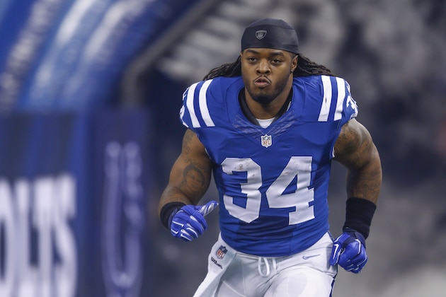 INDIANAPOLIS, IN - DECEMBER  14: Trent Richardson #34 of the Indianapolis Colts takes the field during player introductions before the game against the Houston Texans at Lucas Oil Stadium on December 14, 2014 in Indianapolis, Indiana. (Photo by Michael Hickey/Getty Images)