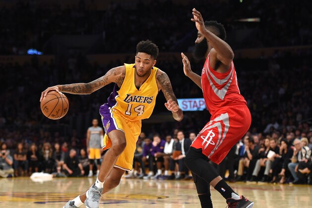 LOS ANGELES, CA - OCTOBER 26:  Brandon Ingram #14 of the Los Angeles Lakers drives on James Harden #13 of the Houston Rockets during a 120-114 season opening Laker win at Staples Center on October 26, 2016 in Los Angeles, California.  NOTE TO USER: User expressly acknowledges and agrees that, by downloading and or using this photograph, User is consenting to the terms and conditions of the Getty Images License Agreement.  (Photo by Harry How/Getty Images)