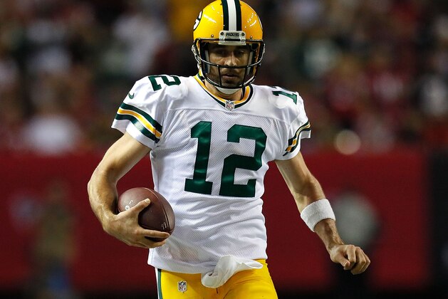 ATLANTA, GA - OCTOBER 30:  Aaron Rodgers #12 of the Green Bay Packers rushes against the Atlanta Falcons at Georgia Dome on October 30, 2016 in Atlanta, Georgia.  (Photo by Kevin C. Cox/Getty Images)