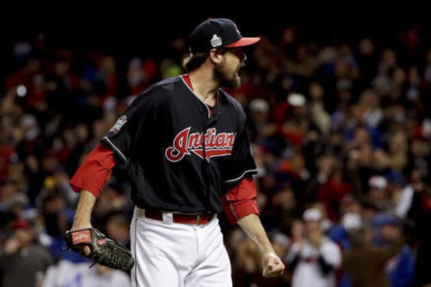 Cleveland Indians relief pitcher Andrew Miller celebrates after the end of the top of the seventh inning against the Chicago Cubs during Game 1 of the Major League Baseball World Series Tuesday, Oct. 25, 2016, in Cleveland. (AP Photo/Matt Slocum)
