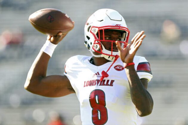 FILE - In a Saturday, Oct. 29, 2016 file photo, Louisville quarterback Lamar Jackson (8) throws a pass during warmups before an NCAA college football game against Virginia in Charlottesville, Va. Jackson has become one of college football’s most recognizable players the first two months of the season. He enters November as a prohibitive favorite to become Louisville’s first Heisman winner. (AP Photo/Ryan M. Kelly, File)