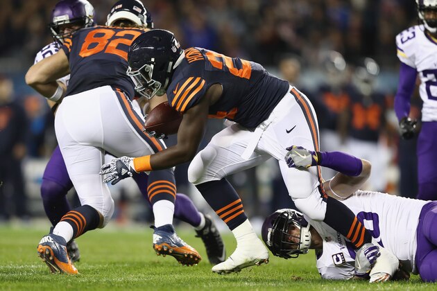 CHICAGO, IL - OCTOBER 31:  Brian Robison #96 of the Minnesota Vikings tackles Jordan Howard #24 of the Chicago Bears during the first half of their game at Soldier Field on October 31, 2016 in Chicago, Illinois.  (Photo by Elsa/Getty Images)