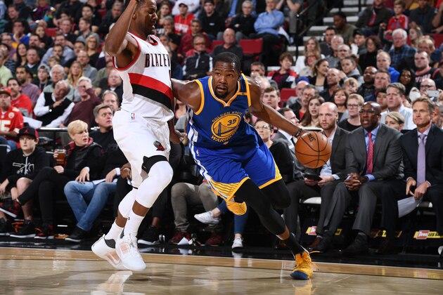 PORTLAND, OR - NOVEMBER 1: Kevin Durant #35 of the Golden State Warriors drives to the basket against the Portland Trail Blazers on November 1, 2016 at Moda Center in Portland, Oregon. NOTE TO USER: User expressly acknowledges and agrees that, by downloading and/or using this photograph, user is consenting to the terms and conditions of the Getty Images License Agreement. Mandatory Copyright Notice: Copyright 2015 NBAE (Photo by Garrett Ellwood/NBAE via Getty Images)