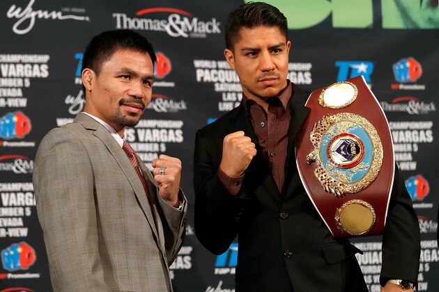 BEVERLY HILLS, CA - SEPTEMBER 08:  Welterweight Manny Pacquiao and Jessie Vargas pose after a press conference at the Beverly Hills Hotel on September 8, 2016 in Beverly Hills, California.  (Photo by Josh Lefkowitz/Getty Images)