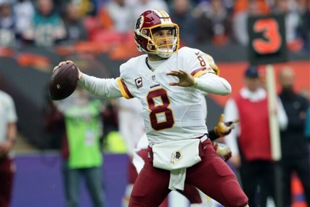 Washington Redskins quarterback Kirk Cousins (8) throws the ball during an NFL Football game between Cincinnati Bengals and Washington Redskins at Wembley Stadium in London, Sunday Oct. 30, 2016. (AP Photo/Tim Ireland)