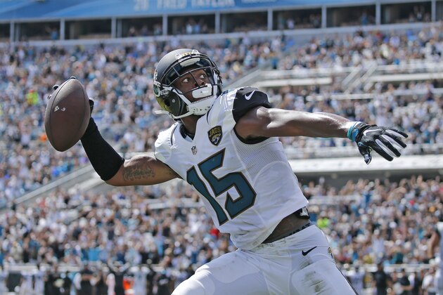 JACKSONVILLE, FL - SEPTEMBER 25: Allen Robinson #15 of the Jacksonville Jaguars throws the ball into the stands after catching a pass for a touchdown against the Baltimore Ravens during the second quarter of an NFL game on September 25, 2016 at EverBank Field in Jacksonville, Florida. (Photo by Joel Auerbach/Getty Images)