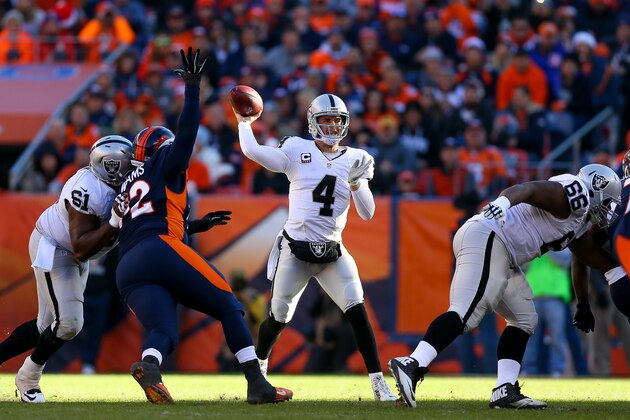 DENVER, CO - DECEMBER 13:  Quarterback Derek Carr #4 of the Oakland Raiders passes against the Denver Broncos during a game at Sports Authority Field at Mile High on December 13, 2015 in Denver, Colorado. (Photo by Justin Edmonds/Getty Images)
