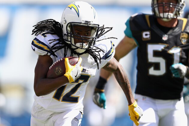 SAN DIEGO, CA - SEPTEMBER 18:  Travis Benjamin #12 of the San Diego Chargers eludes  Paul Posluszny #51 of the Jacksonville Jaguars on a pass play during a game at Qualcomm Stadium on September 18, 2016 in San Diego, California.  (Photo by Sean M. Haffey/Getty Images)