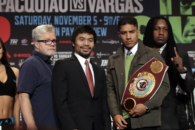 (L-R) Trainer Freddie Roach, boxers Manny Pacquiao of the Philippines, Jessie Vargas of the US, d trainer Dewey Cooper pose during news conference at The Wynn Las Vegas, November 2, 2016.  Pacquiao will challenge Vargas for the WBO Welterweight Championship November 5, 2016 at the Thomas & Mack Center in Las Vegas. / AFP / John GURZINSKI        (Photo credit should read JOHN GURZINSKI/AFP/Getty Images)