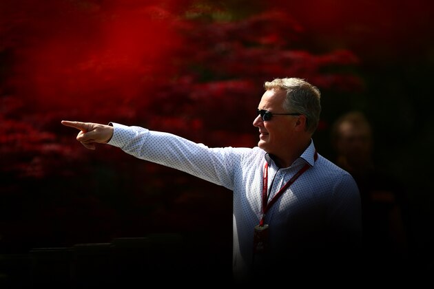 SHANGHAI, CHINA - APRIL 15: Johnny Herbert points at something in the Paddock during practice for the Formula One Grand Prix of China at Shanghai International Circuit on April 15, 2016 in Shanghai, China.  (Photo by Dan Istitene/Getty Images)