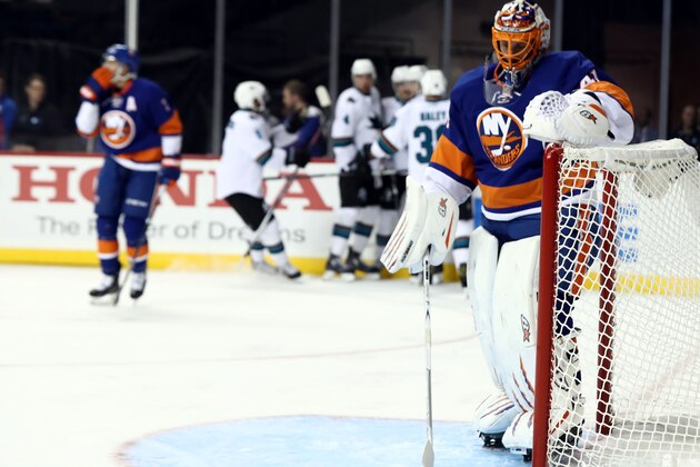 NEW YORK, NY - OCTOBER 16:  Melker Karlsson #68 of the San Jose Sharks celebrates with his teammates after scoring a goal against Jaroslav Halak #41 of the New York Islanders in the first period at Barclays Center on October 18, 2016 in New York City. (Photo by Al Bello/Getty Images North America)