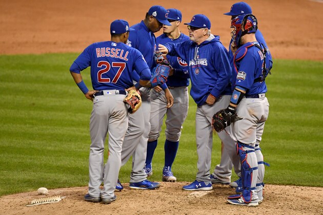 CLEVELAND, OH - NOVEMBER 02:  Aroldis Chapman #54 of the Chicago Cubs talks with manager Joe Maddon as he enters the game during the eighth inning against the Cleveland Indians in Game Seven of the 2016 World Series at Progressive Field on November 2, 2016 in Cleveland, Ohio.  (Photo by Jason Miller/Getty Images)