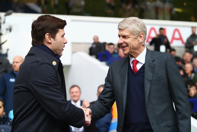 LONDON, ENGLAND - MARCH 05:  Arsene Wenger manager of Arsenal and Mauricio Pochettino manager of Tottenham Hotspur shake hands prior to the Barclays Premier League match between Tottenham Hotspur and Arsenal at White Hart Lane on March 5, 2016 in London, England.  (Photo by Clive Rose/Getty Images)