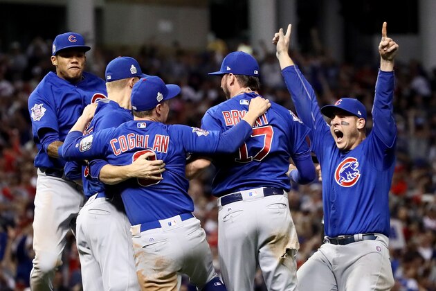 CLEVELAND, OH - NOVEMBER 02:  The Chicago Cubs celebrate after winning 8-7 against the Cleveland Indians in Game Seven of the 2016 World Series at Progressive Field on November 2, 2016 in Cleveland, Ohio. The Cubs win their first World Series in 108 years.  (Photo by Ezra Shaw/Getty Images)