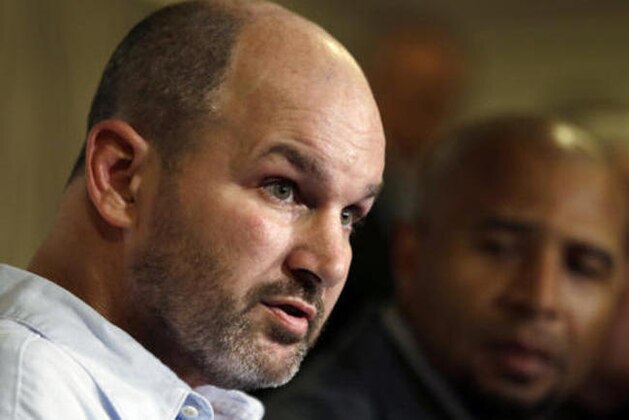 FILE - In this April 9, 2013 file photo, former NFL player Kevin Turner, left, speaks beside former player Dorsey Levens during a news conference in Philadelphia. Researchers in Boston announced Thursday, Nov. 3, 2016, that Turner, who died in March from complications of amyotrophic lateral sclerosis (ALS) at the age of 46, had the most advanced stage of Chronic Traumatic Encephalopathy (CTE) with motor neuron disease. (AP Photo/Matt Rourke, File)