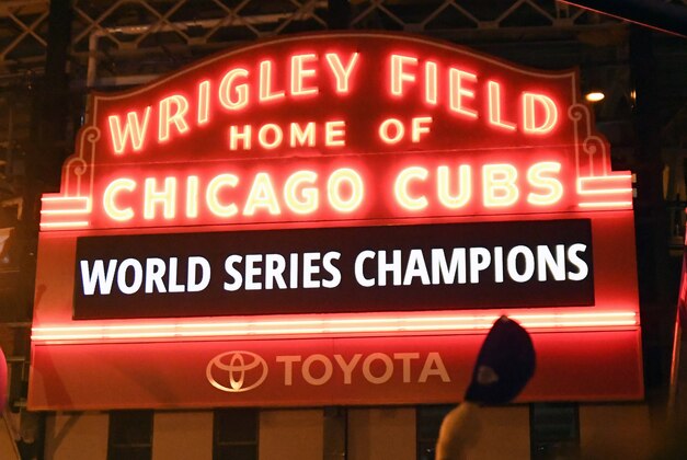 Nov 2, 2016; Chicago, IL, USA;  A general view of the marquee with fans celebrating after game seven of the 2016 World Series against the Cleveland Indians outside of Wrigley Field. Cubs won 8-7. Mandatory Credit: Patrick Gorski-USA TODAY Sports