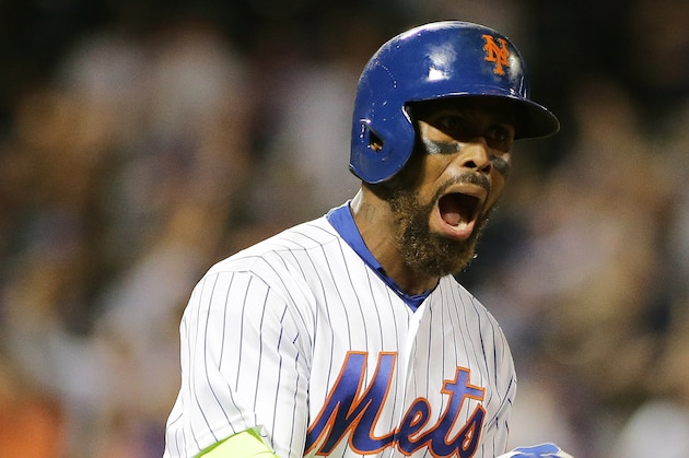 Sep 22, 2016; New York City, NY, USA; New York Mets third baseman Jose Reyes (7) reacts after hitting a two run home run against the Philadelphia Phillies during the ninth inning at Citi Field. The Mets won 9-8.  Mandatory Credit: Andy Marlin-USA TODAY Sports