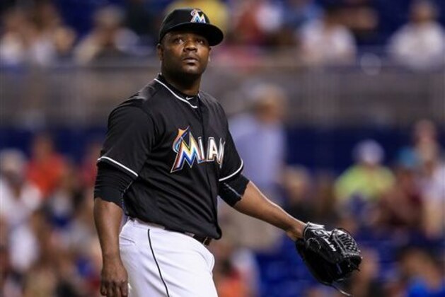 Miami Marlins relief pitcher Fernando Rodney walks off the field during the seventh inning of a baseball game against the Atlanta Braves on Saturday, Sept  24, 2016, in Miami. The Marlins defeated the Braves 6-4.  (AP Photo/Rob Foldy)