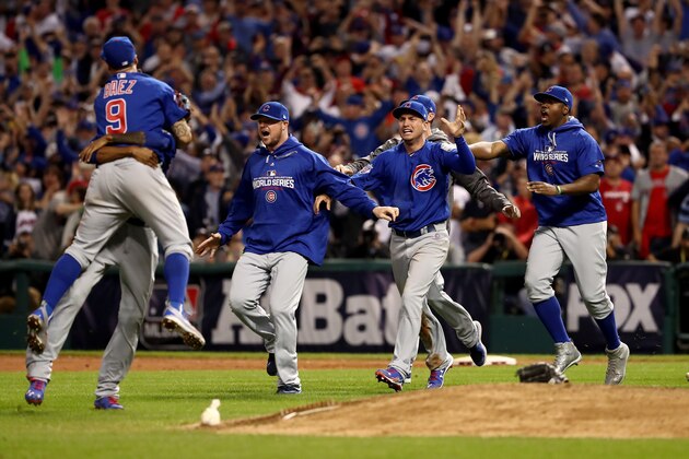 CLEVELAND, OH - NOVEMBER 02:  The Chicago Cubs celebrate after defeating the Cleveland Indians 8-7 in Game Seven of the 2016 World Series at Progressive Field on November 2, 2016 in Cleveland, Ohio. The Cubs win their first World Series in 108 years.  (Photo by Elsa/Getty Images)