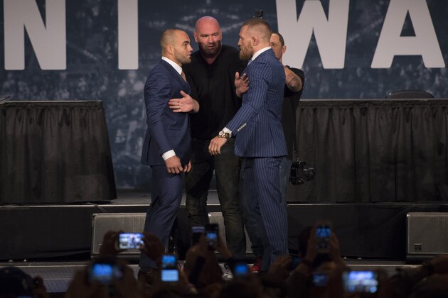 NEW YORK, NY - SEPTEMBER 27:  (L-R) UFC lightweight champion Eddie Alvarez and UFC featherweight champion Conor McGregor face off for the media and fans during the UFC 205 press event at Madison Square Garden on September 27, 2016 in New York City. (Photo by Jeff Bottari/Zuffa LLC/Zuffa LLC via Getty Images)