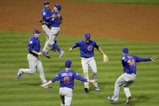 The Chicago Cubs celebrate after Game 7 of the Major League Baseball World Series against the Cleveland Indians Thursday, Nov. 3, 2016, in Cleveland. The Cubs won 8-7 in 10 innings to win the series 4-3.(AP Photo/Gene J. Puskar)