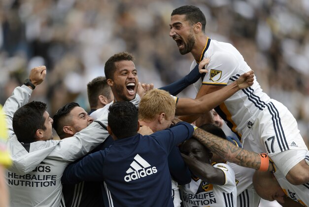 Oct 30, 2016; Carson, CA, USA; LA Galaxy forward Giovani dos Santos (10) celebrates with his team after scoring a goal against Colorado Rapids during the second half at StubHub Center. The LA Galaxy won 1-0. Mandatory Credit: Kelvin Kuo-USA TODAY Sports