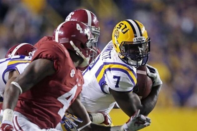 LSU running back Leonard Fournette (7) carries in the first half of an NCAA college football game against Alabama in Baton Rouge, La., Saturday, Nov. 8, 2014. (AP Photo/Gerald Herbert)