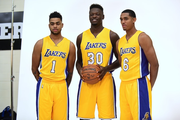 D'Angels Russell (L), Julius Randle (C) and Jordan Clarkson (R) of the 2016 Los Angeles Lakers pose during media day on September 26, 2016 in El Segundo, California ahead of the start of the 2016-17 NBA season.  / AFP / Frederic J. BROWN        (Photo credit should read FREDERIC J. BROWN/AFP/Getty Images)