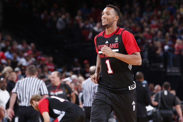 PORTLAND, OR -  OCTOBER 2:  Evan Turner #1 of the Portland Trail Blazers smiles and runs off the court during the team's annual Fan Fest event October 2, 2016 at the Moda Center in Portland, Oregon. NOTE TO USER: User expressly acknowledges and agrees that, by downloading and or using this photograph, user is consenting to the terms and conditions of the Getty Images License Agreement. Mandatory Copyright Notice: Copyright 2016 NBAE (Photo by Sam Forencich/NBAE via Getty Images)