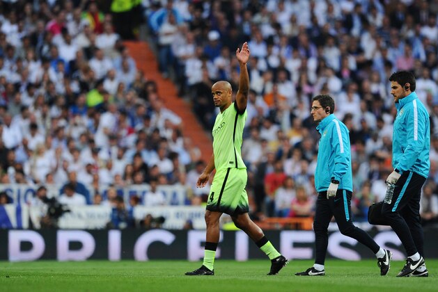 MADRID, SPAIN - MAY 04:  Vincent Kompany of Manchester City leaves the field after suffering from an injury during the UEFA Champions League semi final, second leg match between Real Madrid and Manchester City FC at Estadio Santiago Bernabeu on May 4, 2016 in Madrid, Spain.  (Photo by David Ramos/Getty Images )